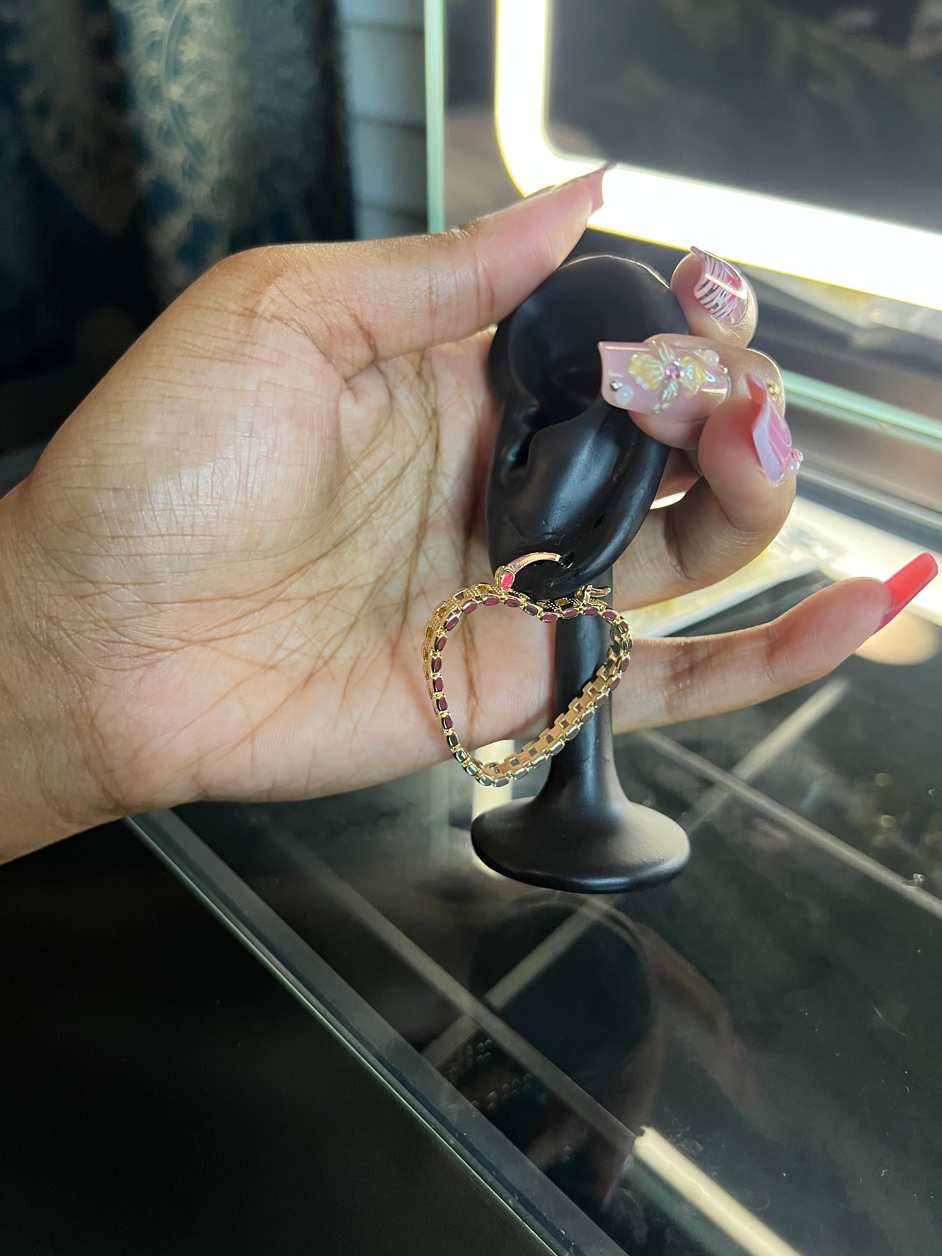 Small Rolex hoop earrings