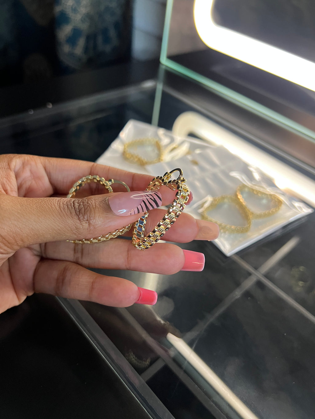 Small Rolex hoop earrings