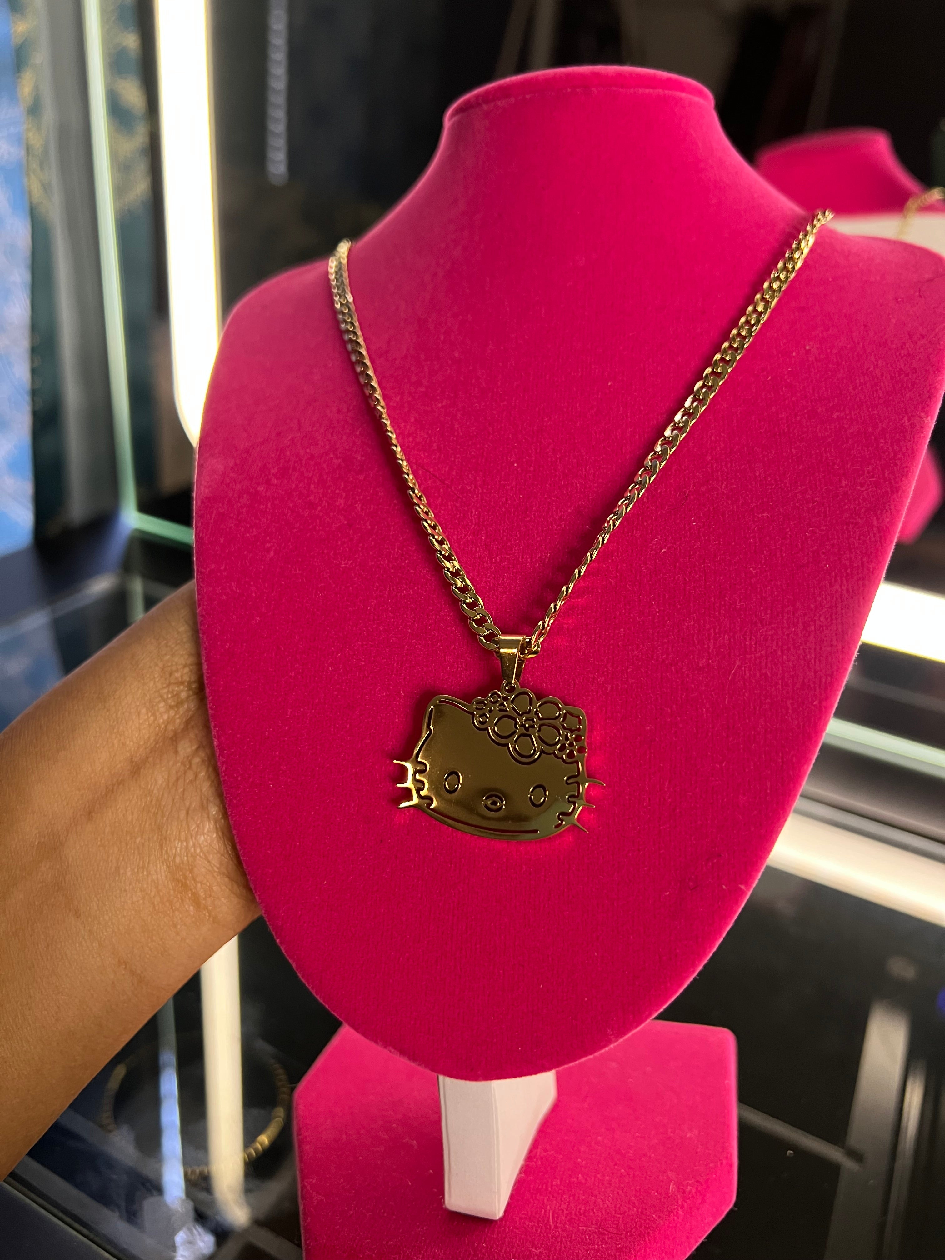 Gold kitty face necklace