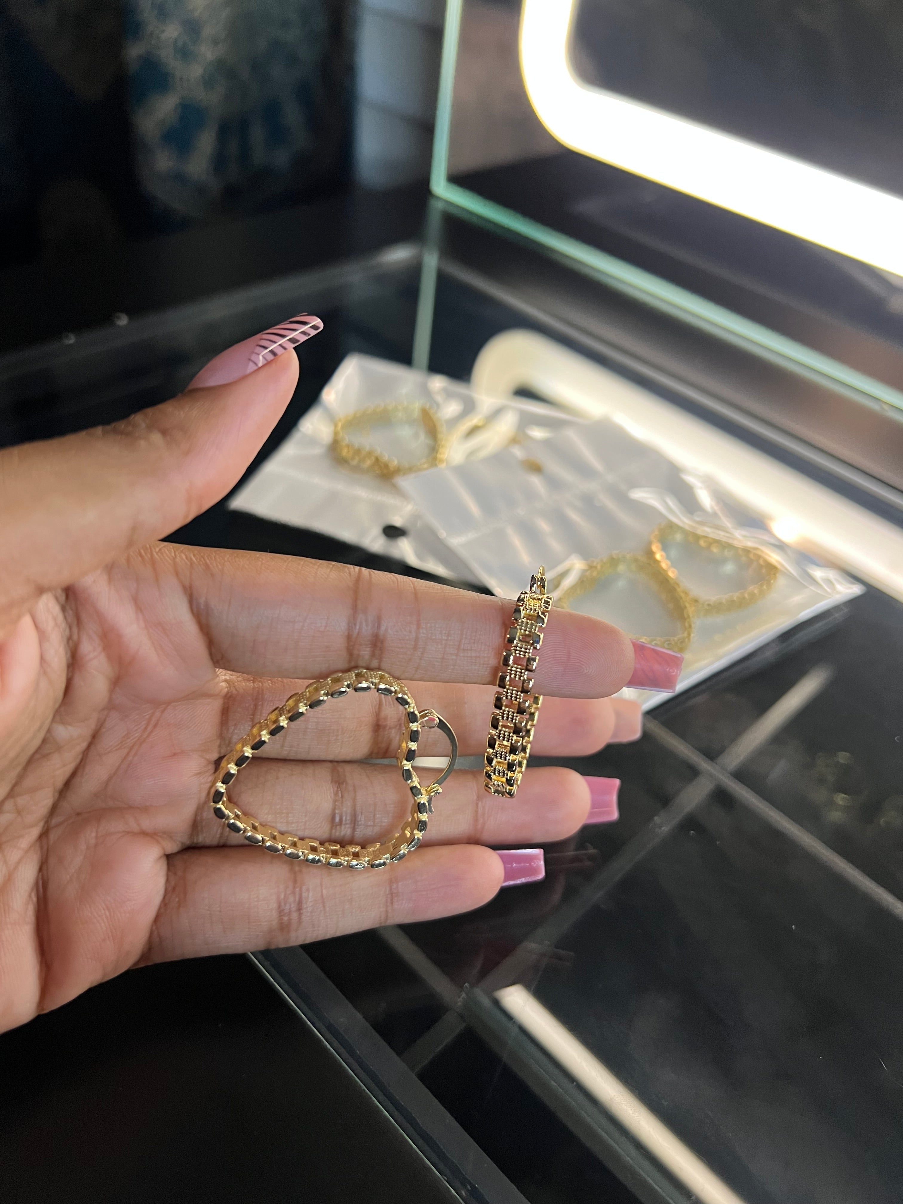 Small Rolex hoop earrings