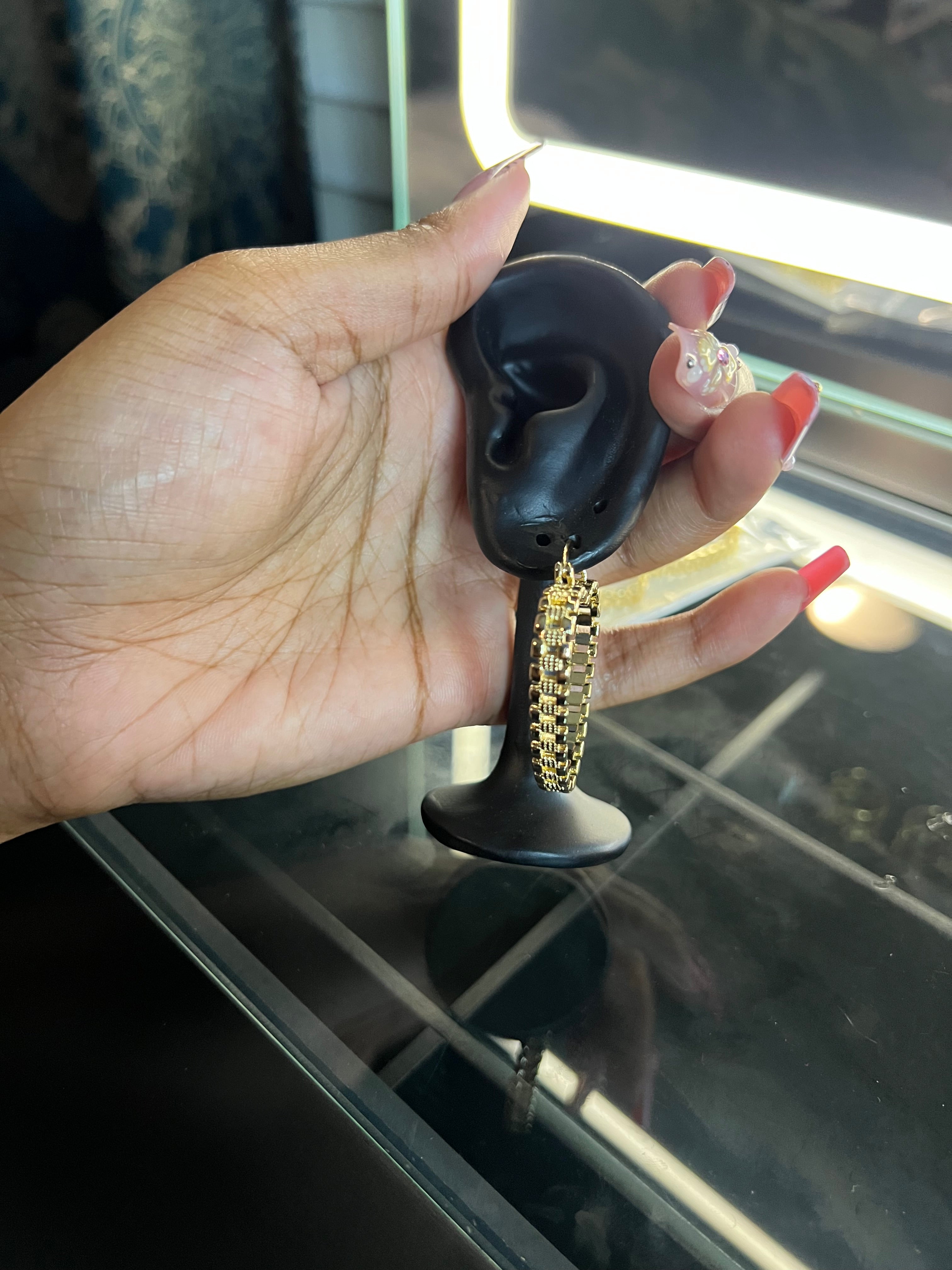 Small Rolex hoop earrings