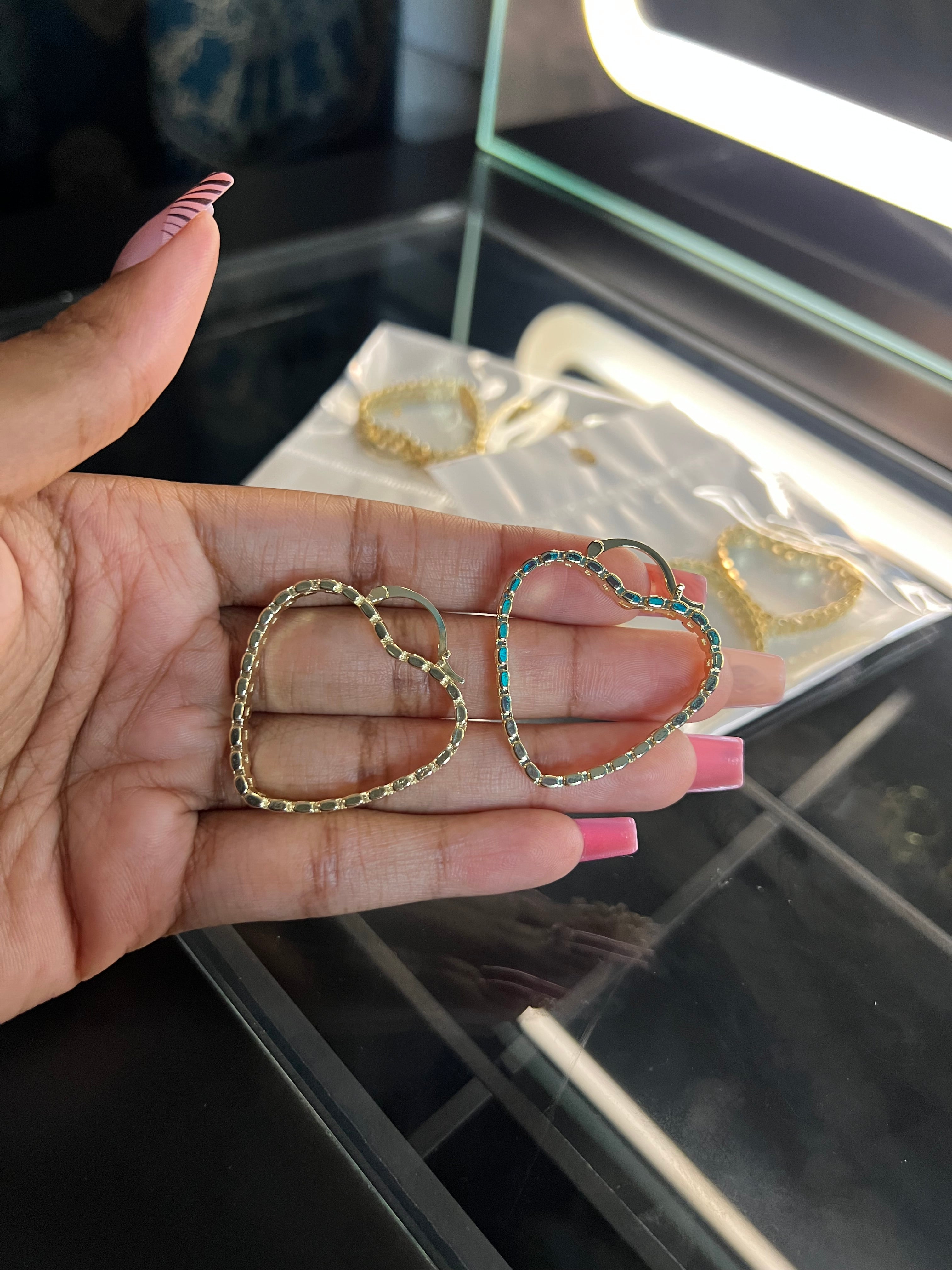 Small Rolex hoop earrings